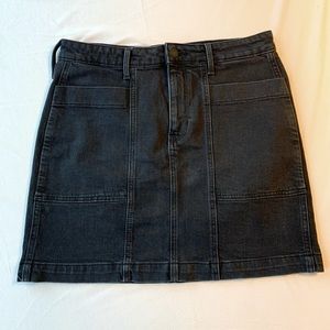 Black denim mini skirt